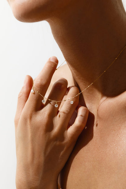 Liabelle 18K Goldkette mit 4 weißen Topasen