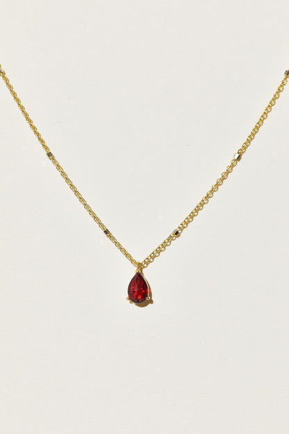 Kette aus 18K Gold mit Granat in Tropfenform